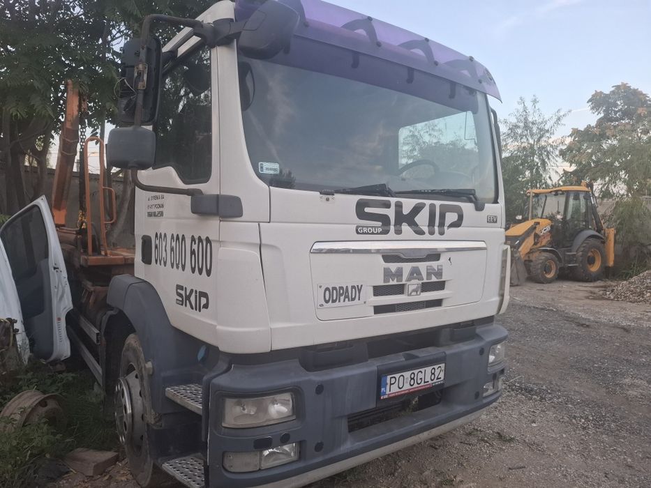 Man 18,250 abrollkipper cu lanțuri pentru containiera container moluz moloz skip  18 tone recent adus