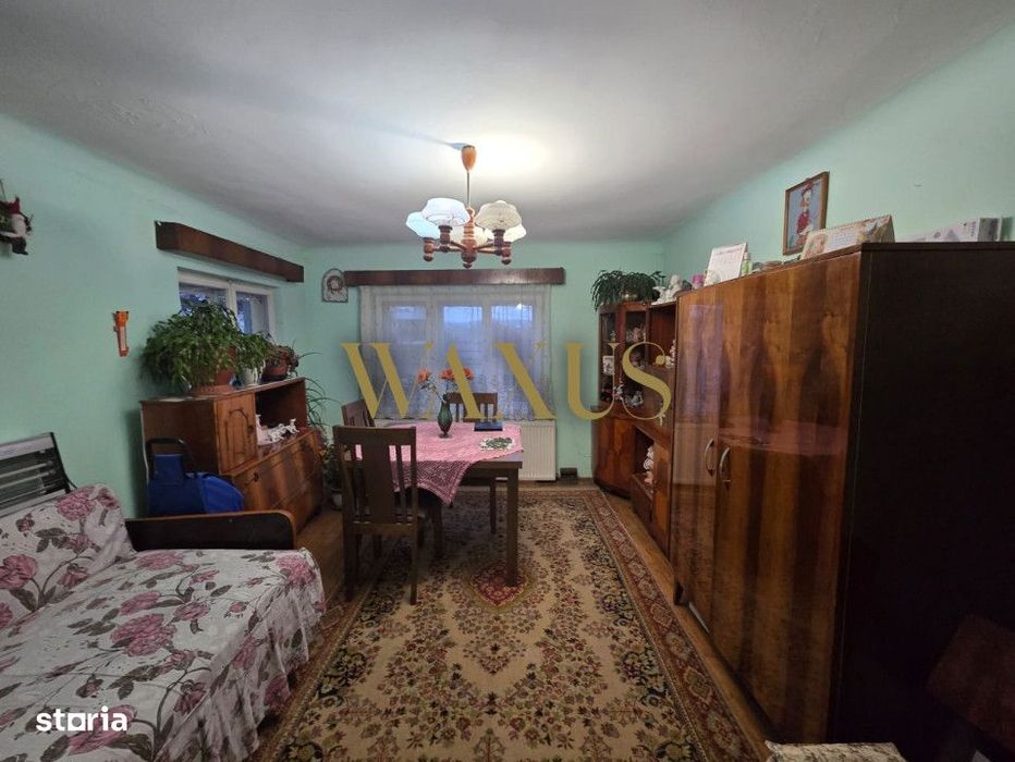 Casa de vanzare cu 2 camere si curte generoasa in zona Gruia
