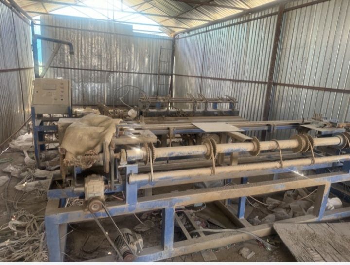 Станок по производству сетки рабицы.