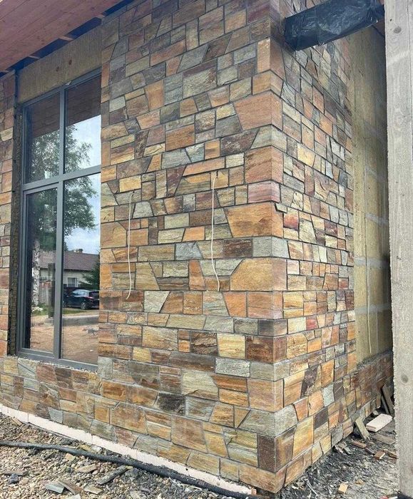 Облицовка дома натуральным камнем
