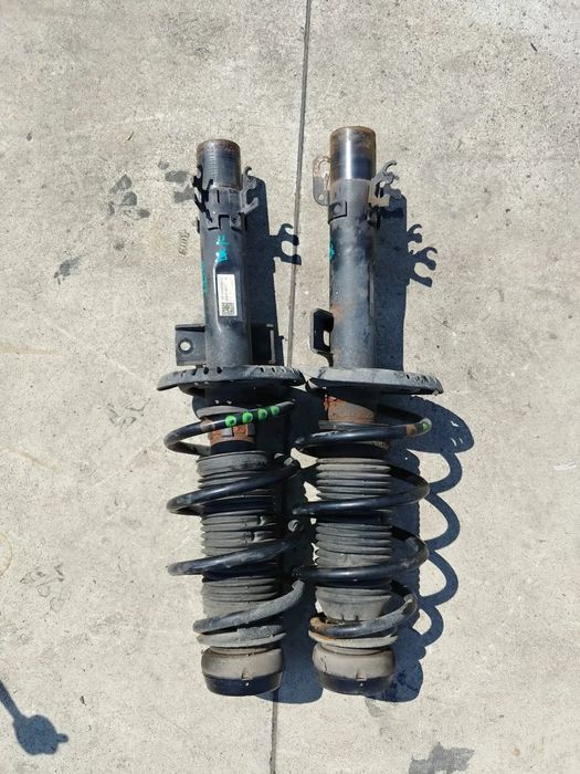 set amortizoare telescoape cu arcuri fata 1.2 tdi seat ibiza 6j 6r0413031f