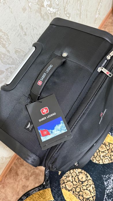 Продам новый чемодан