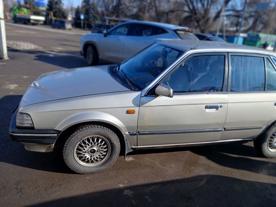 Продам машину мазда 323