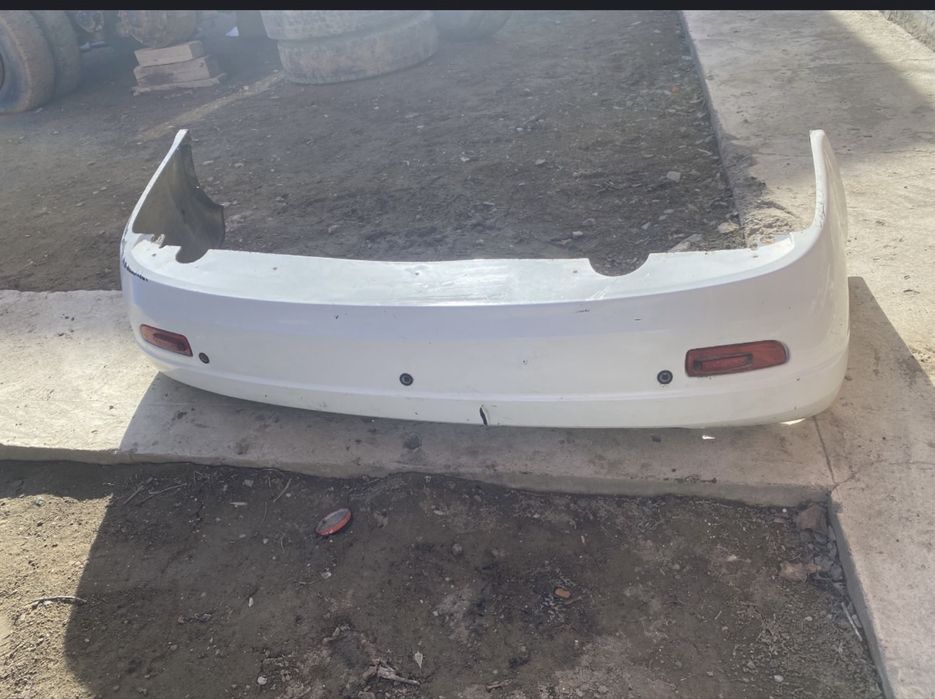 зажний бампер приора 1