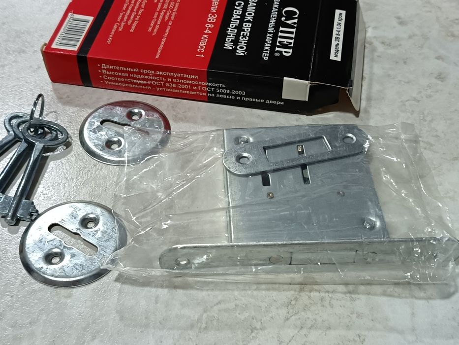 Замок врезной новый
