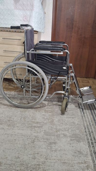 Инвалидная коляска