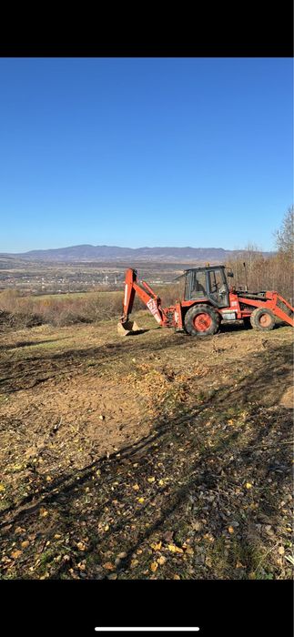 Buldoexcavator fai komatsu