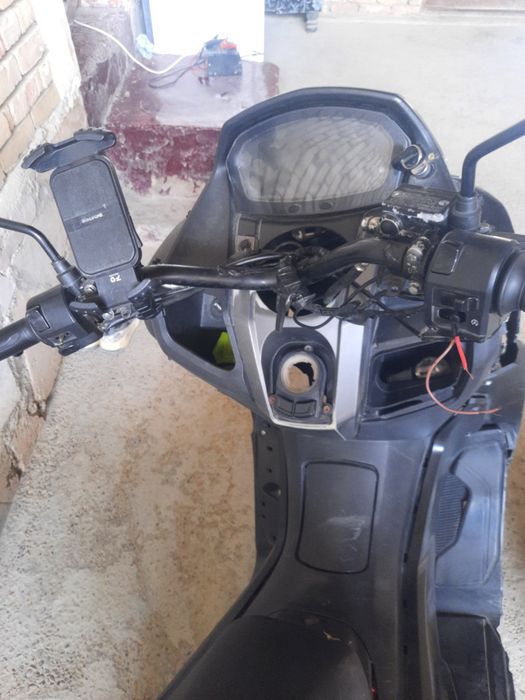 Motosikl benzinli holati o'rtacha