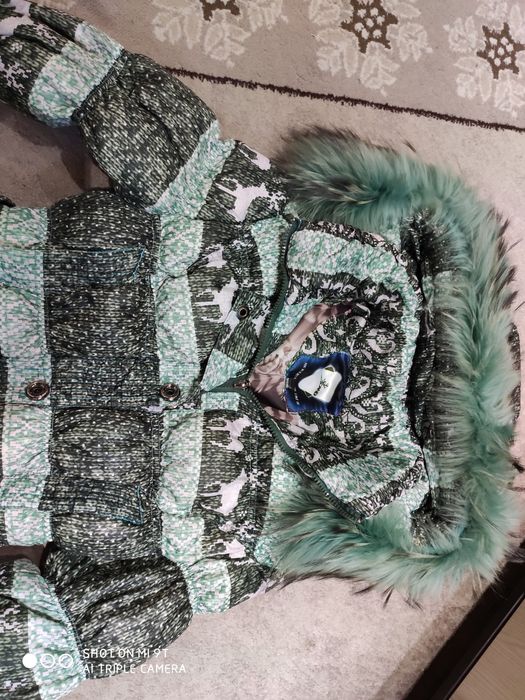 Продам пуховик женский