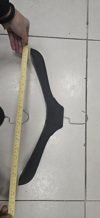 Закачалки за дрехи с храмови държачи