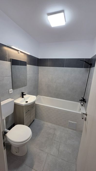Apartament 3 camere 2 băi, bloc nou, mobilat și utilat complet.