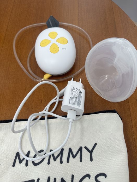 Помпа Medela Solo hands-free с чисто нова чашака