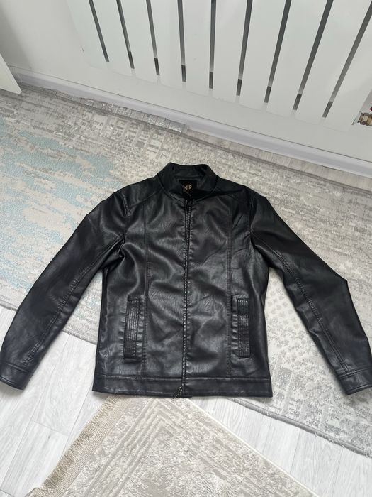 Кожаная куртка бренда