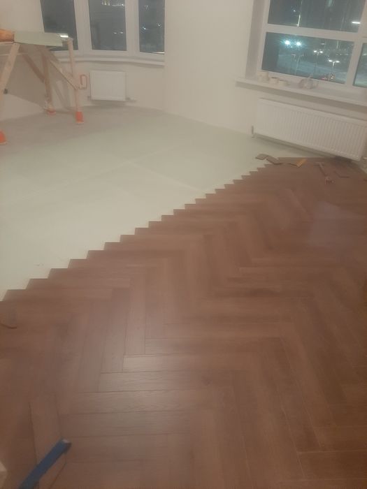 Укладка ламината и кварцвинила, монтаж плинтусов