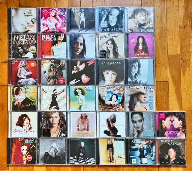 Lot CD orig: Thalia, ABBA, Melua, N. Jones, Madonna, Carey, Shakira, Estefan, Lopez..