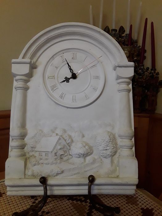 Ceas deosebit reprezentand un peisaj