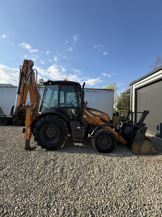 Buldoexcavator Case 580 st, 1400 H, an 2021