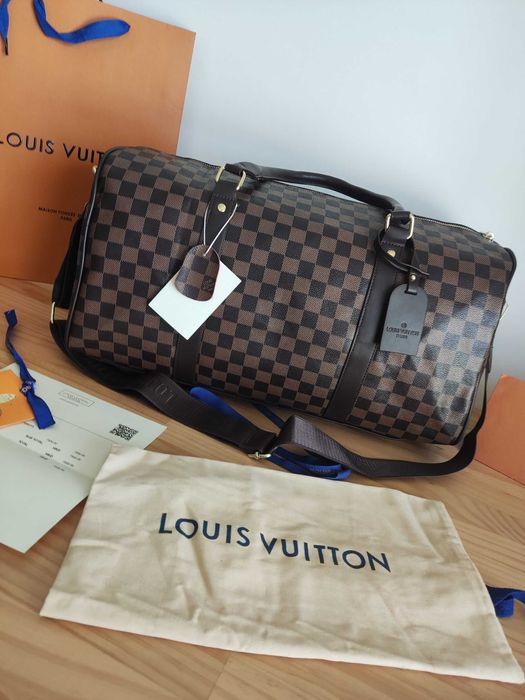 In stoc voiaj, geanta sport piele Louis Vuitton 1109.12