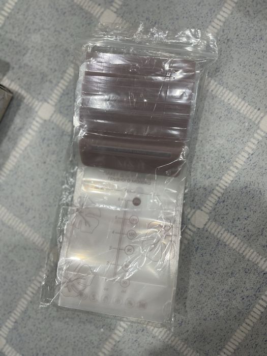 Продам Электрический Молокоотсос 2шт.