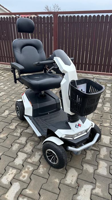 Scaun electric scuter dizabilitati tricicleta handicap carut carucior