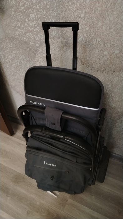 Продам детскую коляску чемодан Luxmom