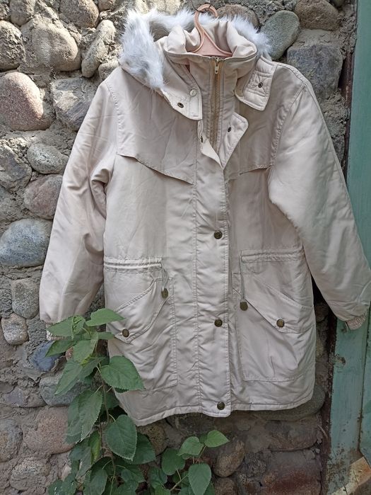 Теплющая женская куртка