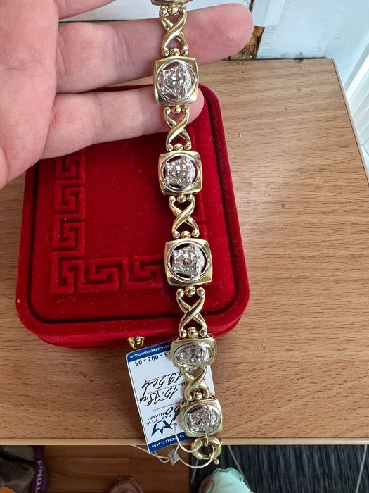 Золотой браслет Версаче