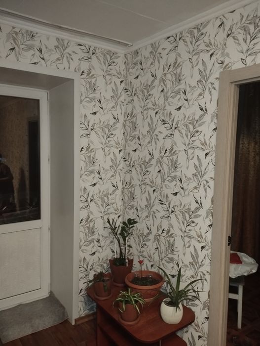 Поклейка  обоев.