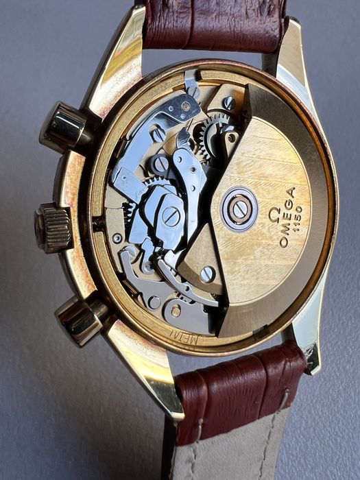 18 k aur Omega Speedmaster Moonphase,Triple Date ref. 175.0034 cal.1150