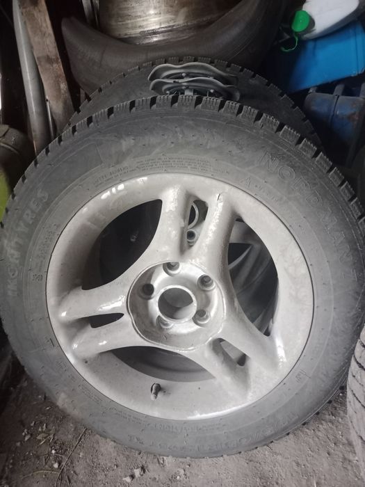 Зимние калеса с дисками  Волгу