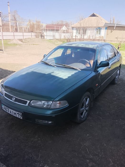 Мазда кронус жасыл түсті