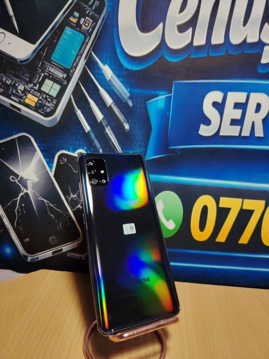 Samsung A51 NOU are folia pe mărgini
