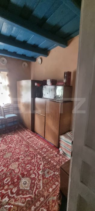 Casa cu doua corpuri