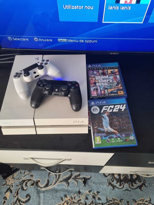 Ps4 utilizat , doua manete si doua jocuri.