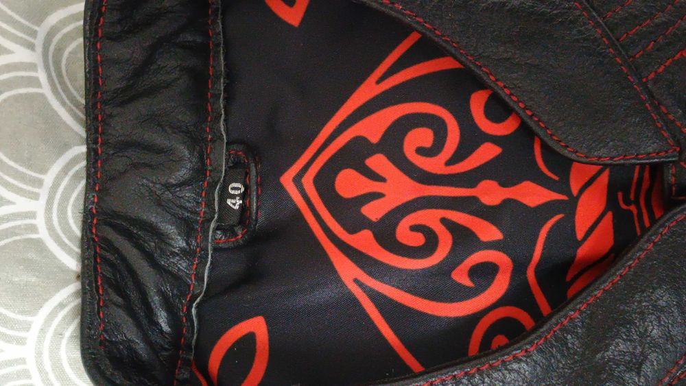 Дамски кожен елек