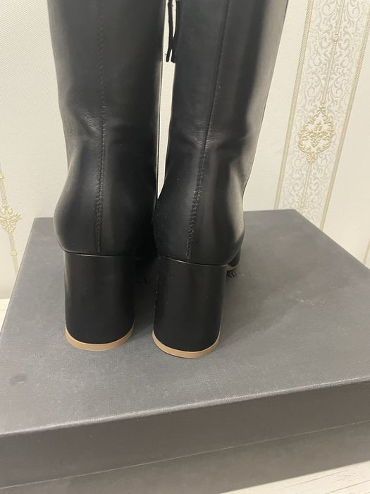 Продам женские сапоги.