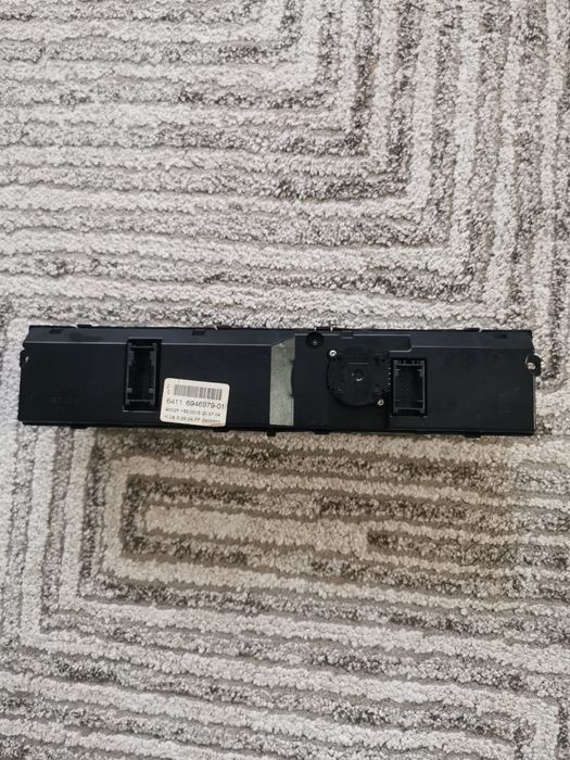 Panou de control pentru BMW E60 original fara zgarieturi,sparturi