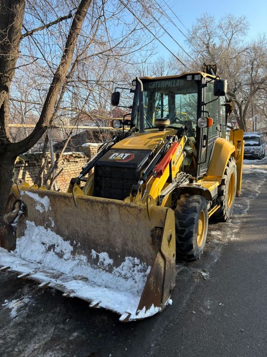 Экскаватор-погрузчик CAT