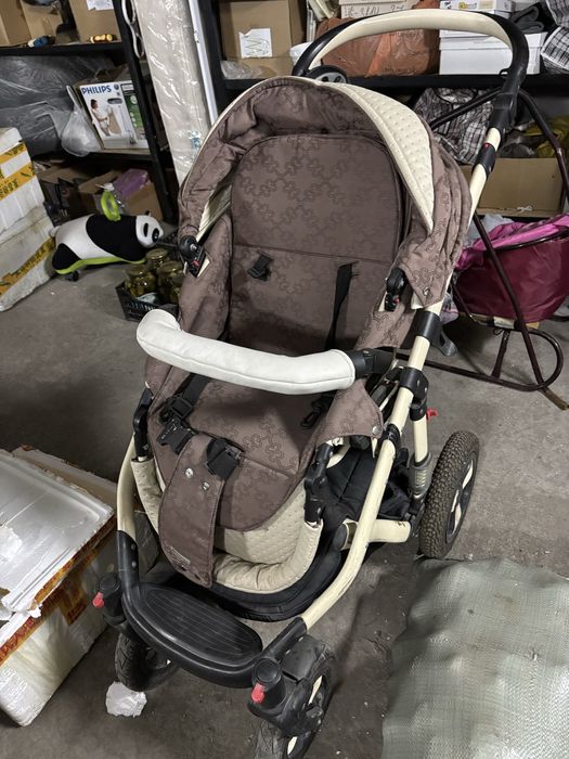 Детская коляска три в одном.