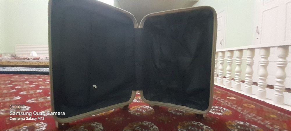 Tozo ishlatilmagan chamadon