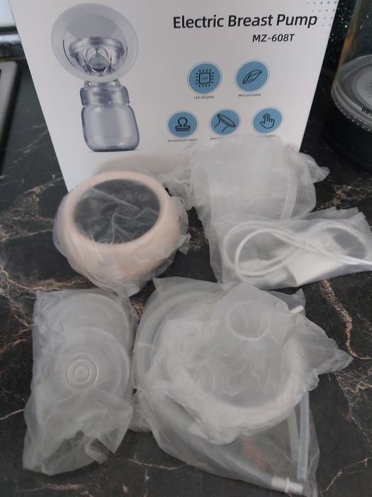 Продам электрический молокоотсос