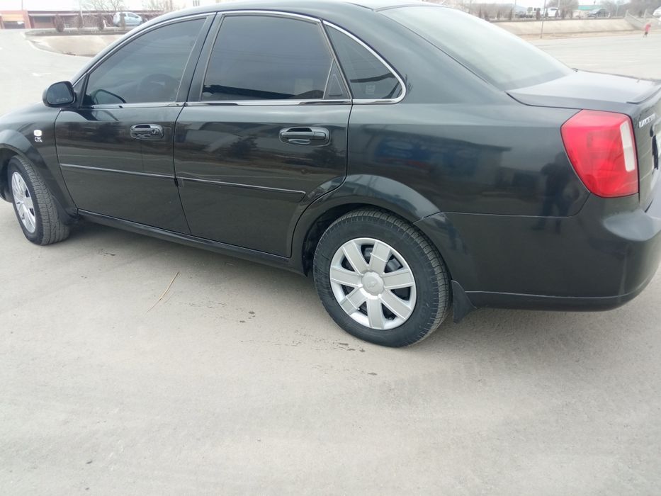 Ласетти 2011 йил холати яхши бензин и метандаям юриди удор йук