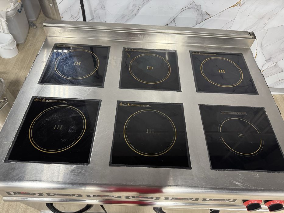 Продам индукционную плиту трехфазную 8-ми канфорную с печкой в 2 уровн