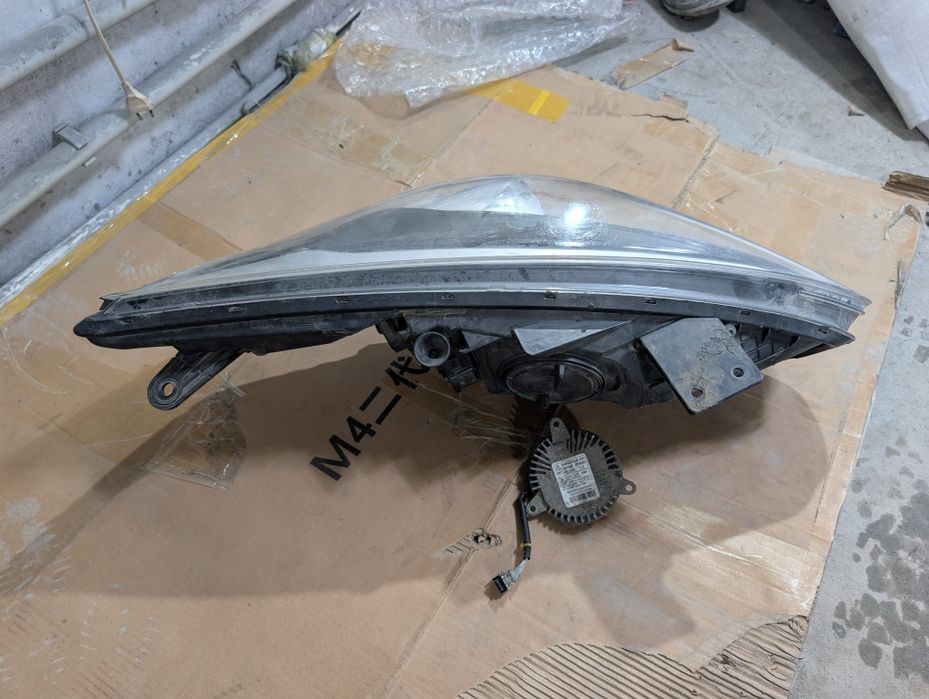 Фара левая Киа Каренс