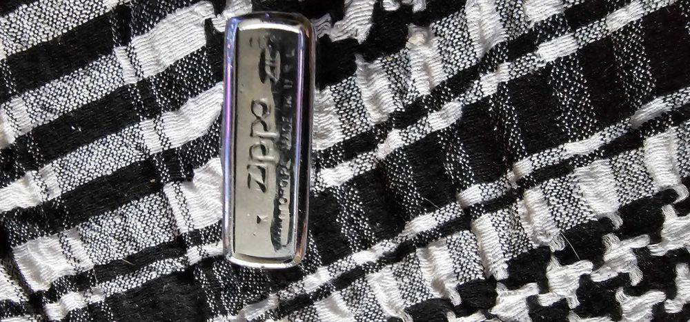 Bricheta zippo fara capac inscriptionata HOLY HAWK