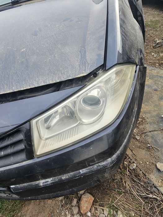 Far stânga dreapta cu lupa Renault megan 2 an 2005