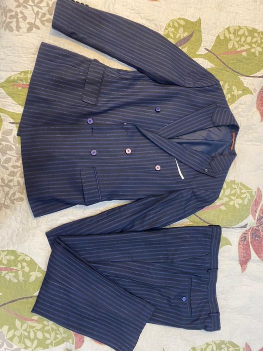 мужские костюмы.