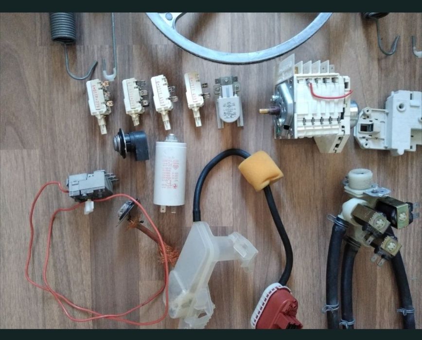 Piese electrice și mecanice pentru masini de spalat