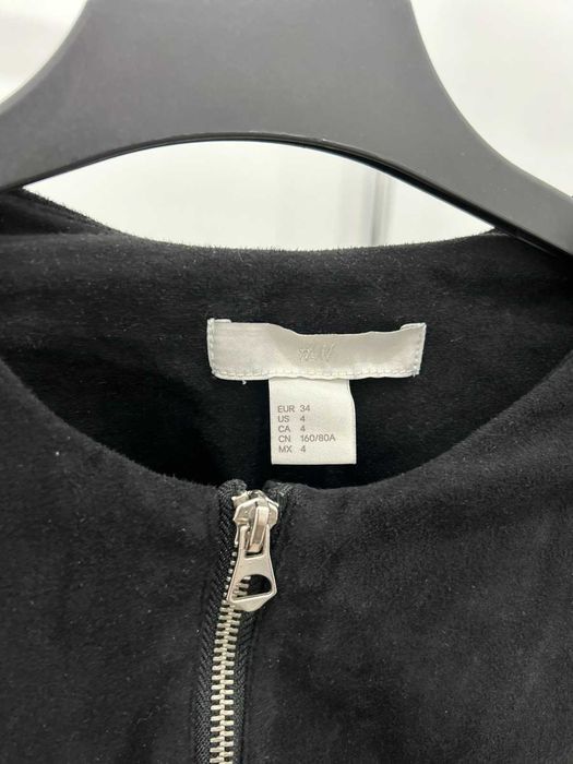 Елегантна връхна дреха