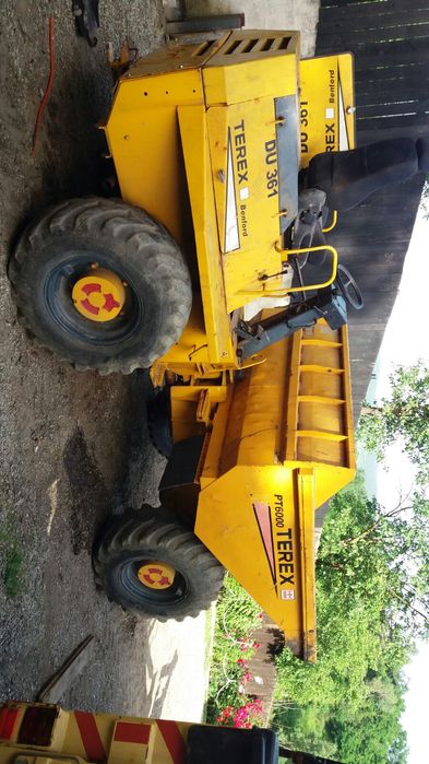 Buldoexcavator cu picon Dumper , Cilindru compactor